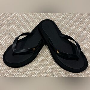 Tory Burch Black Flip Flop Sandals with Gold Logo Accent